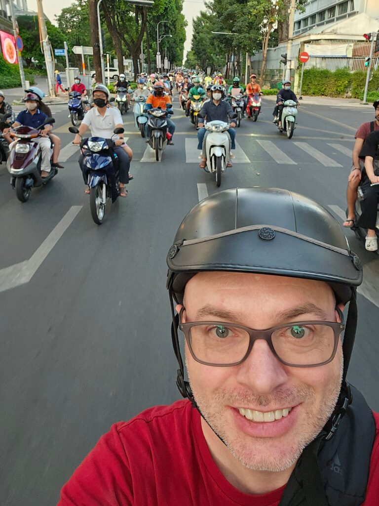 Ron on a scooter in Vietnam