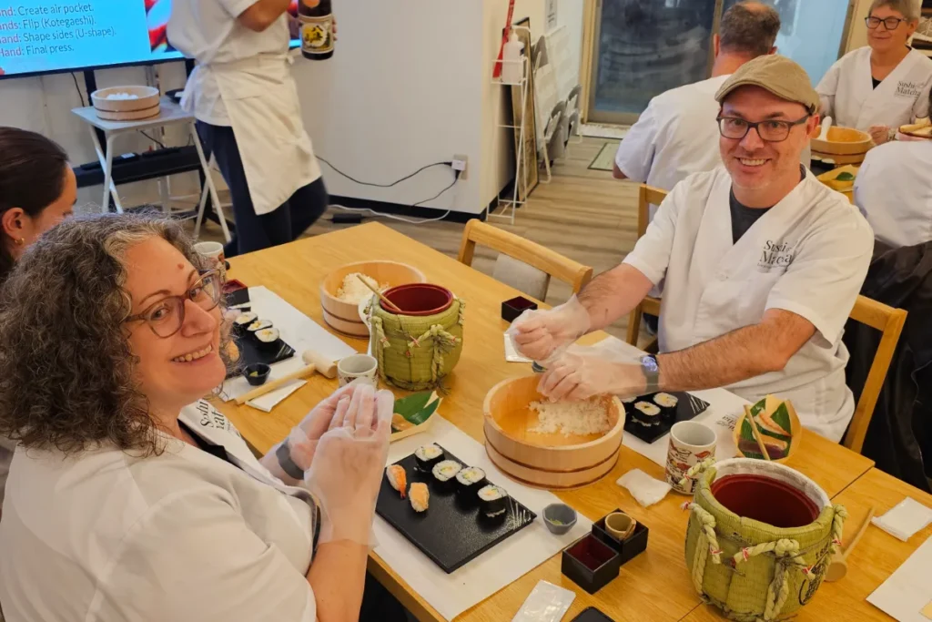 Ron and Dana making sushi
